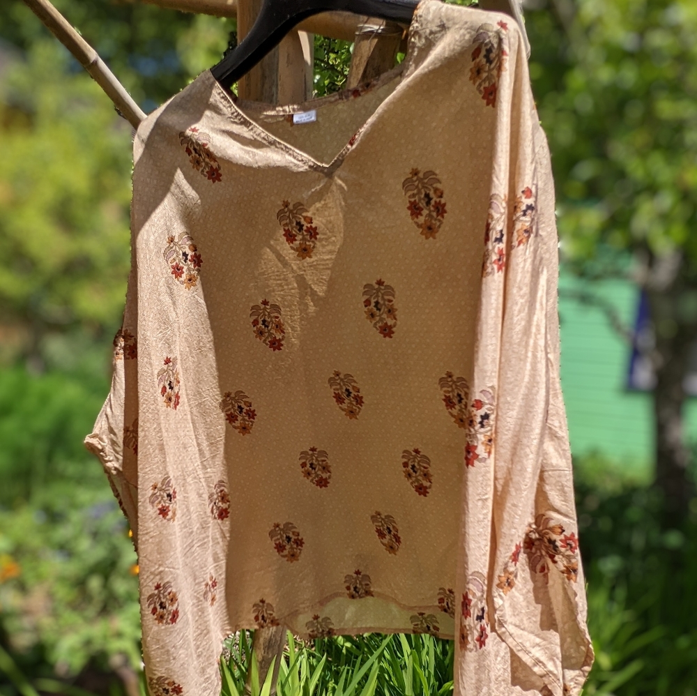 100% silk top with bat-type sleeves (set in)